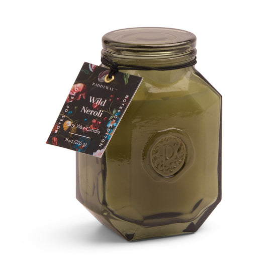 The Botanica Candle - Wild Neroli is a green glass jar candle with lid and floral tag by Paddywax, part of the Luxurious Botanica Collection. Contains 8 oz (226 g) wax. Pair with matching candles and diffusers for a full fragrance experience.